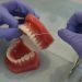 floss stuck in teeth